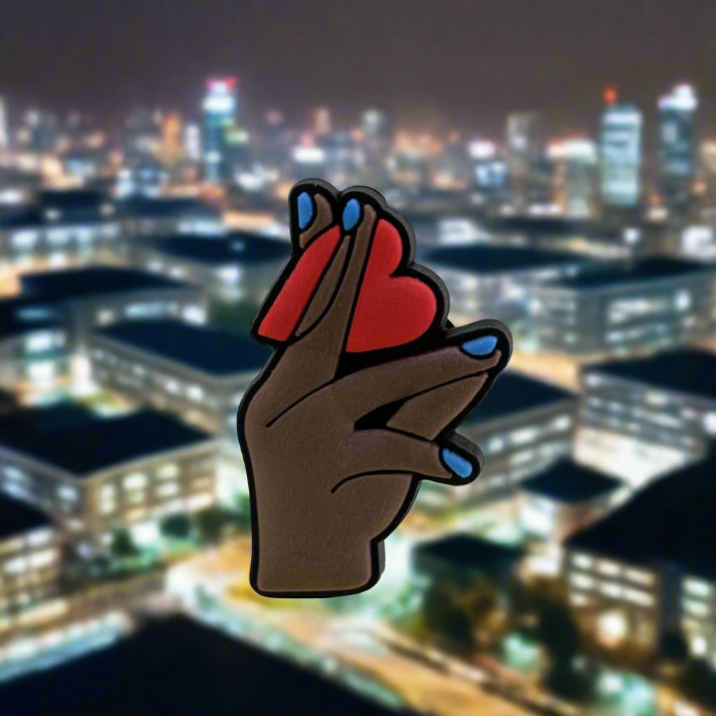 Hand Holding Heart Charm